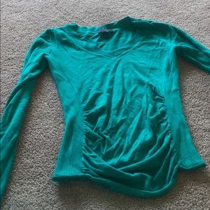 Teal green sweaters